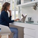 woman working from home sitting in home office
