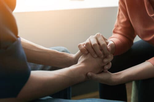 doctor comforting patient during medical detox