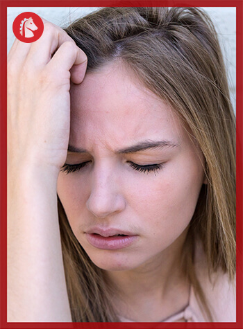 woman experiencing the symptoms of phenibut withdrawal