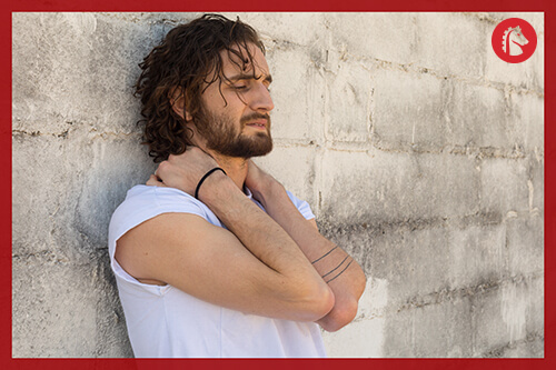 man experiencing the common symptoms of drug withdrawal