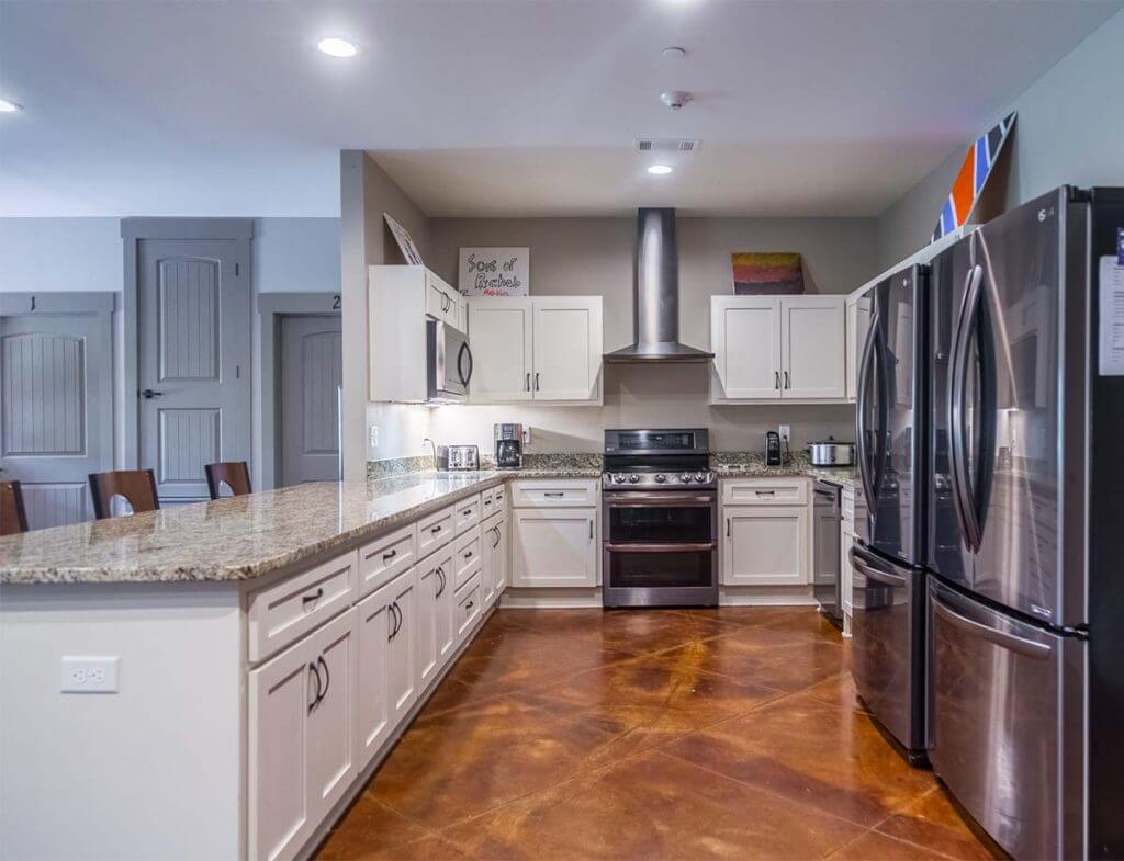 Nutrition and dietetics classes take place in the kitchens of transitional homes adjacent to the Oxford Outpatient Center. Each house has a large kitchen and dining room where patients cook and eat together.
